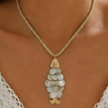 Collier Femme Disque Coquillage avec Pompon