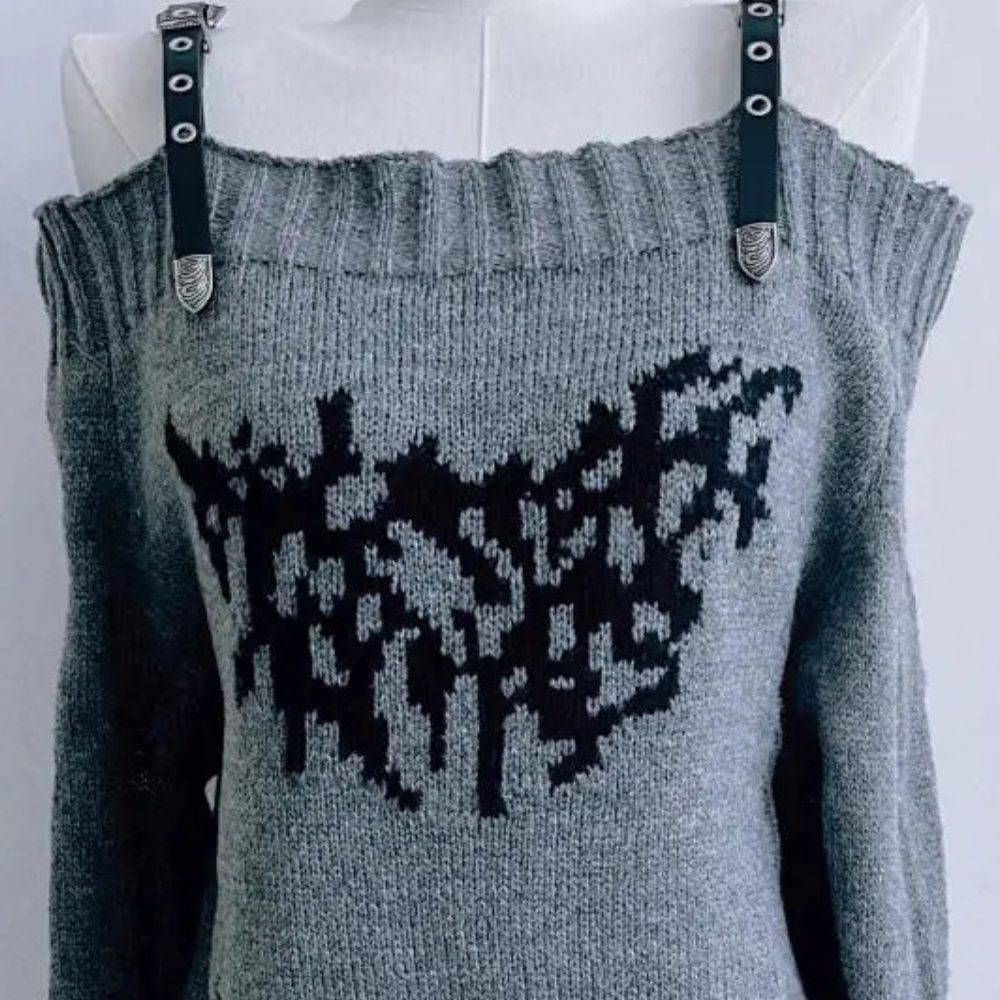 Pull noir oversize en maille motif rouge